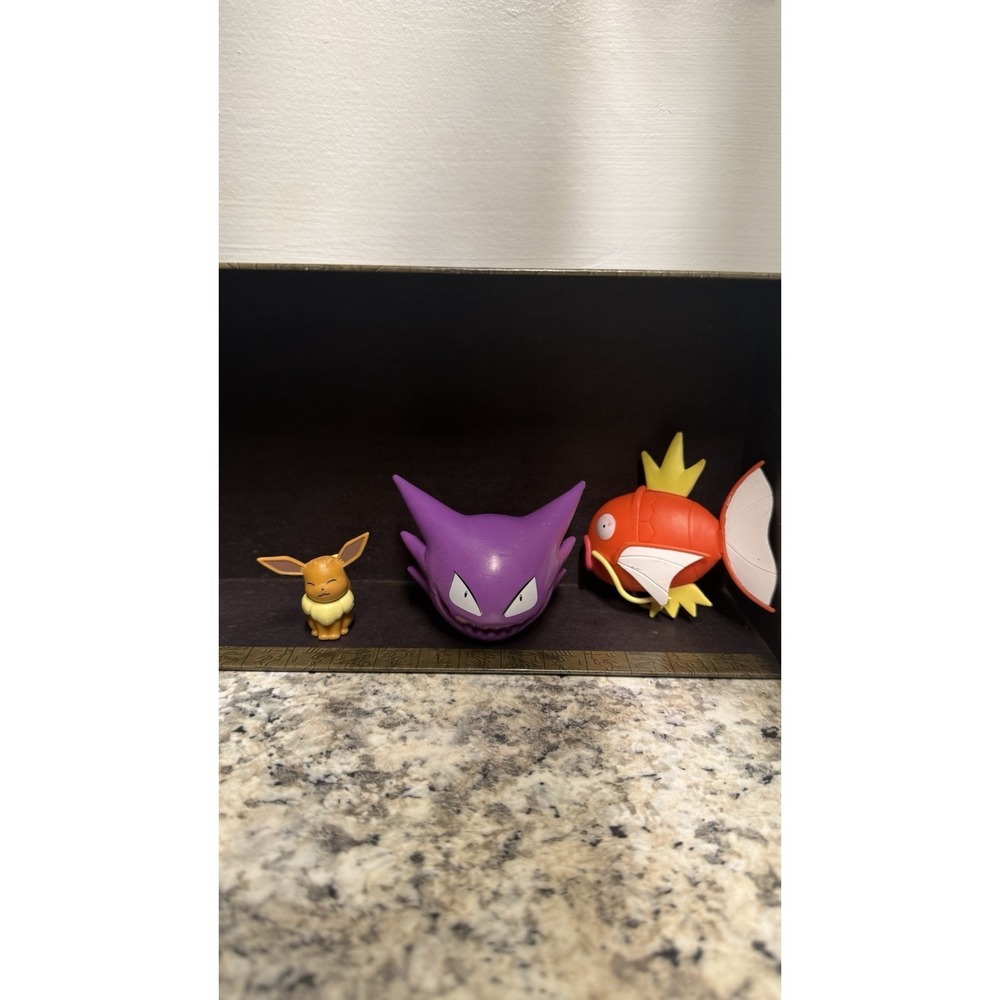 Pokemon Gengar, Eevee, and Magikarp toys
